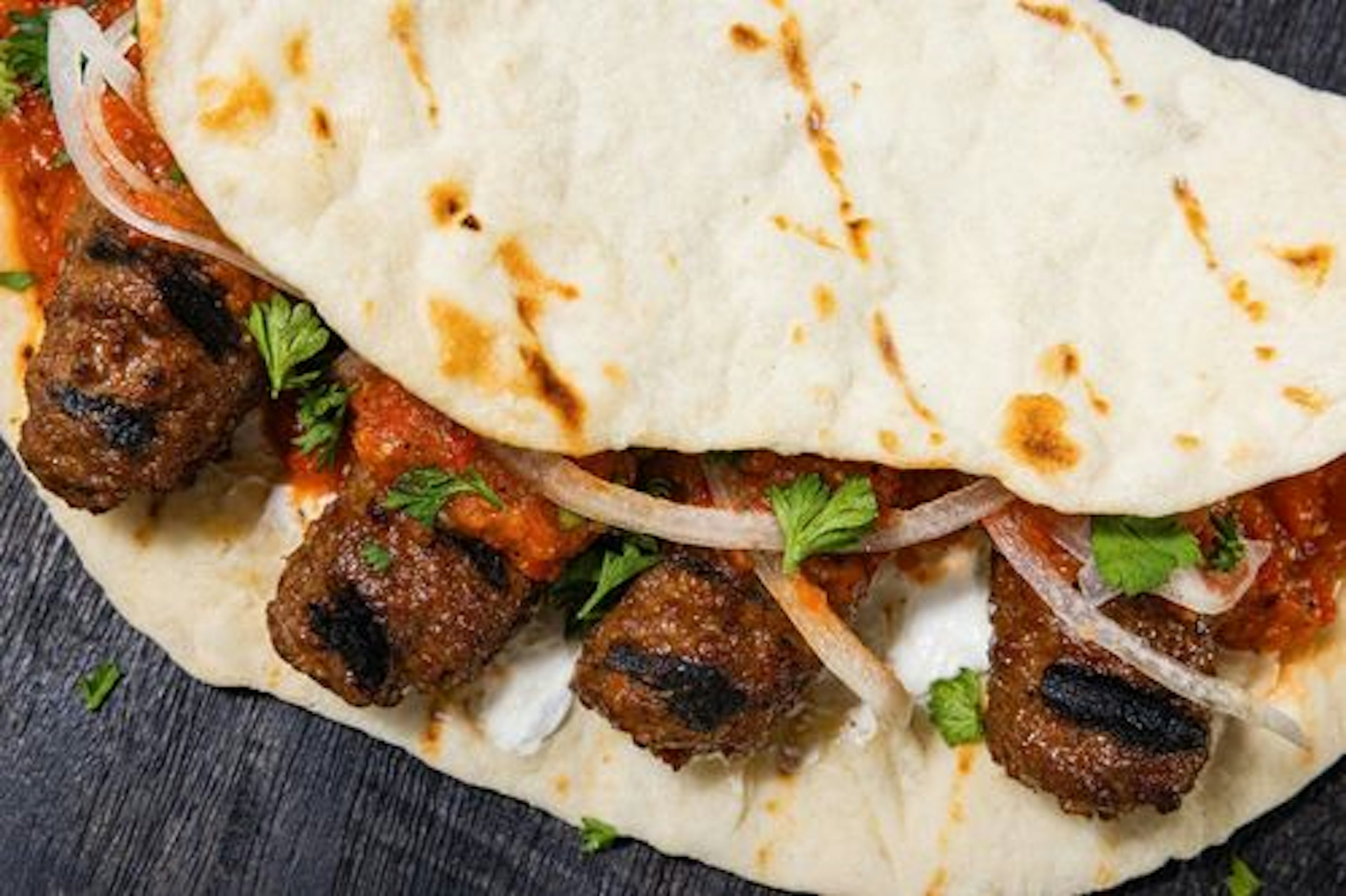 Cevapi with Ajvar and Flat Bread