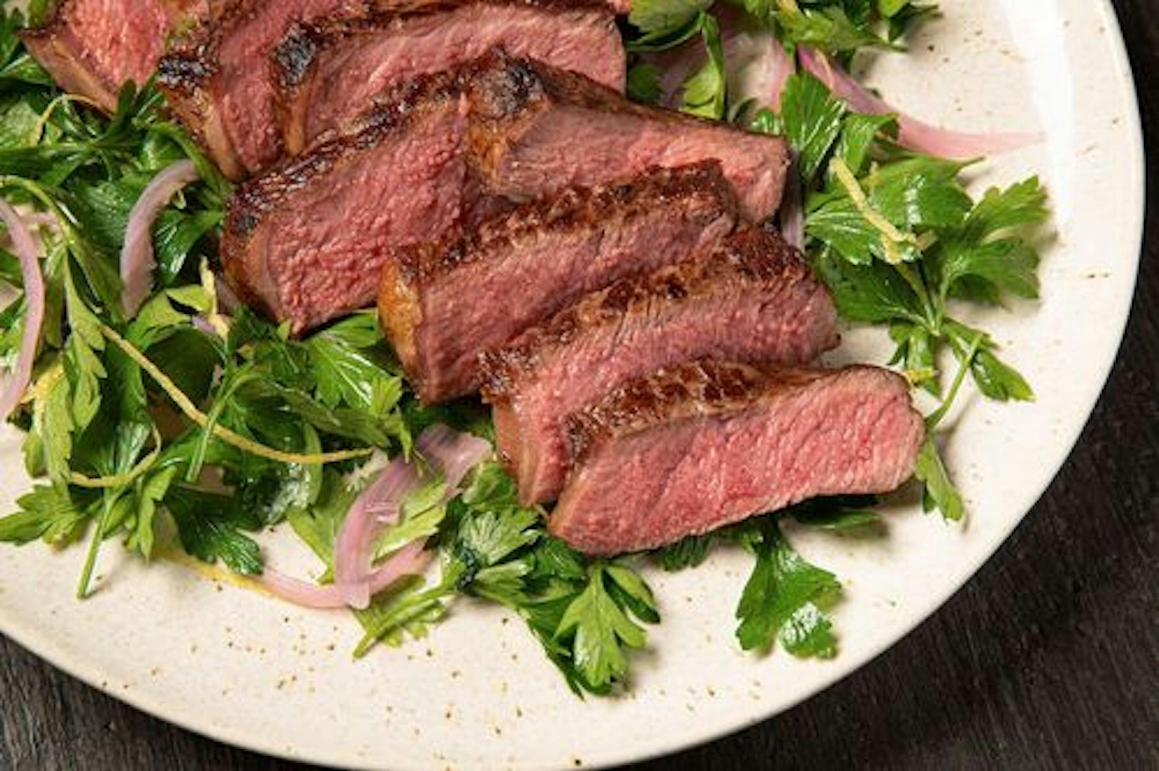 Slow Seared Strip Steak with Pickled Shallot and Parsley Salad